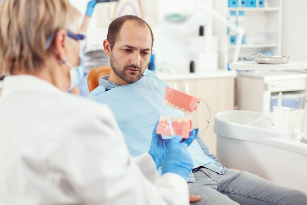 Patient examining a dental crown